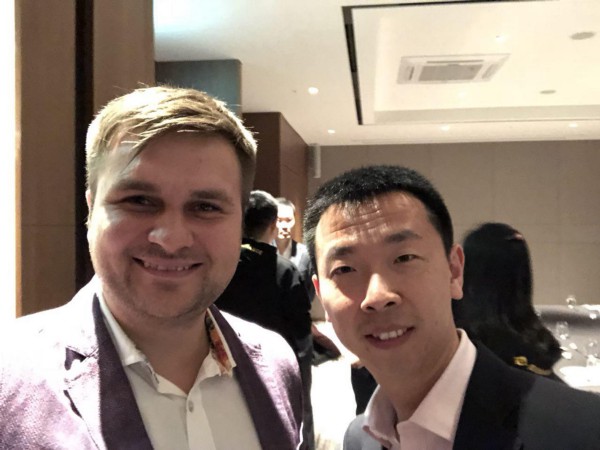 Dmitriy Budorin with Johnson Zhao, the global development director of NEO_Blockchain
